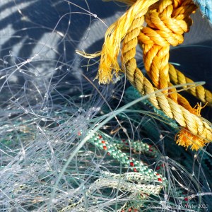 Fishing gear stacked on the quayside