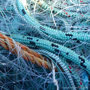 Fishing gear stacked on the quayside