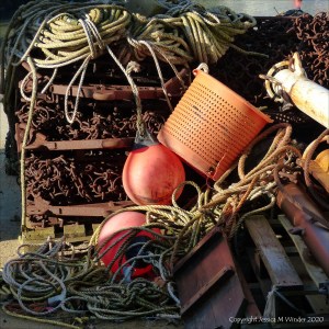 Fishing gear stacked on the quayside