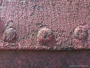 Weathered paintwork on iron