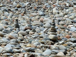 Prbble cairns on a river bank