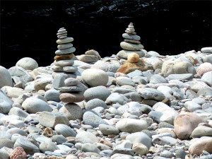 Prbble cairns on a river bank