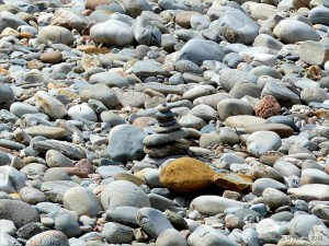 Prbble cairns on a river bank