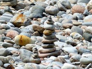Prbble cairns on a river bank