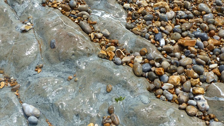 Pebbles on the beach rocks