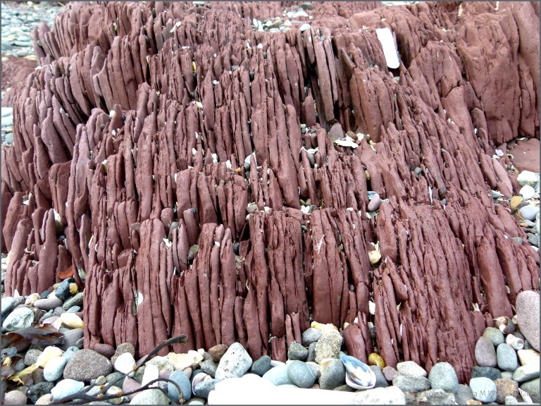 Red rocks on the seashore
