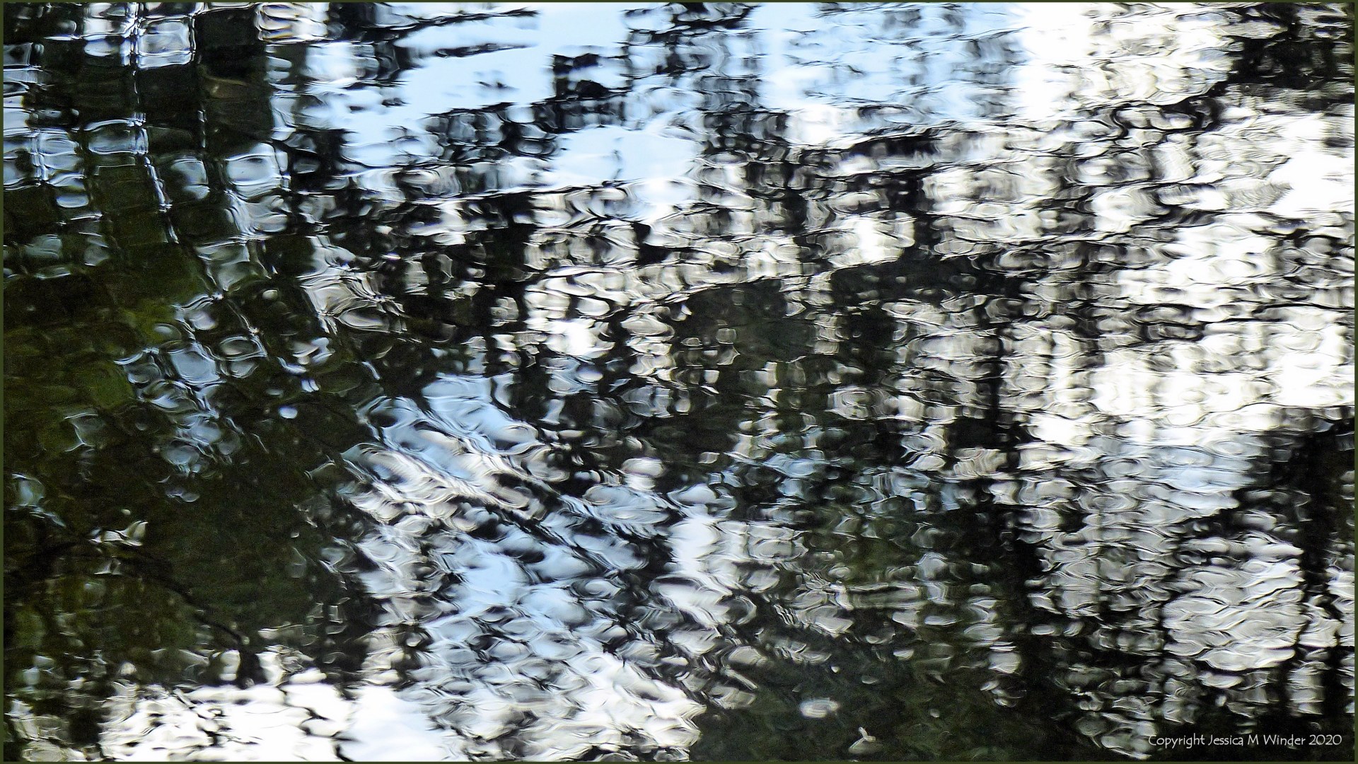Natural abstract patterns in reflections on water