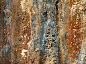 Iron-stained patterns on limestone rocks
