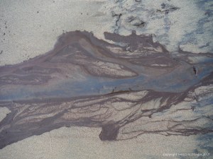Natural patterns on sand from storm water run-off
