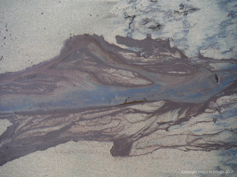 Natural patterns on sand from storm water run-off