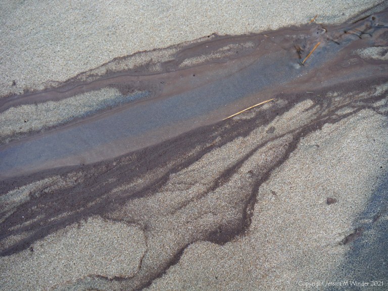 Natural patterns on sand from storm water run-off