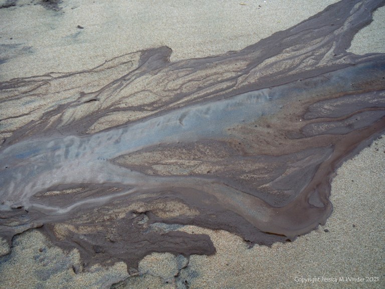 Natural patterns on sand from storm water run-off