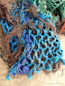 Fishing net washed up as flotsam on the beach