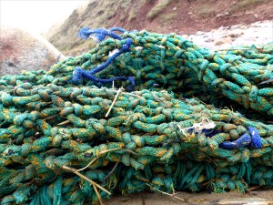 Fishing net washed up as flotsam on the beach