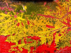 Close-up detail of red buoy washed up on sandy beach as flotsam