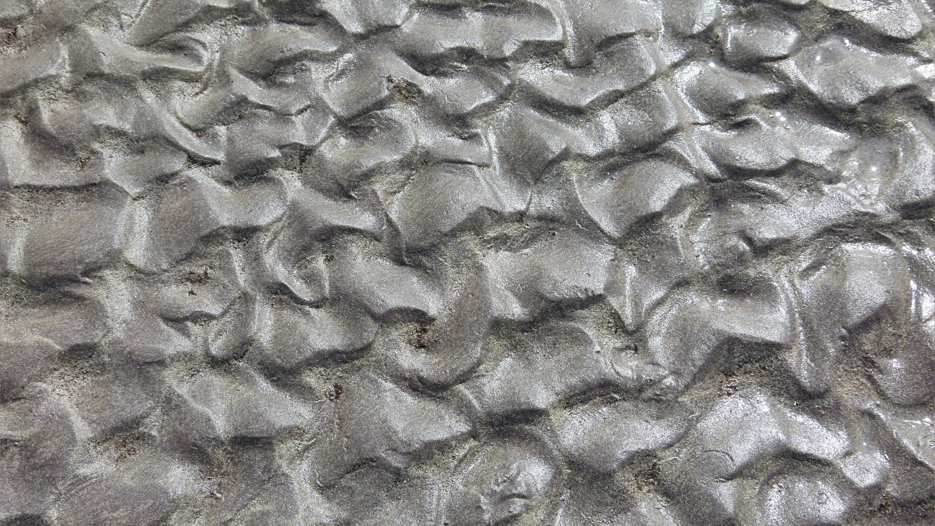 Ripple texture patterns in sand on the seashore