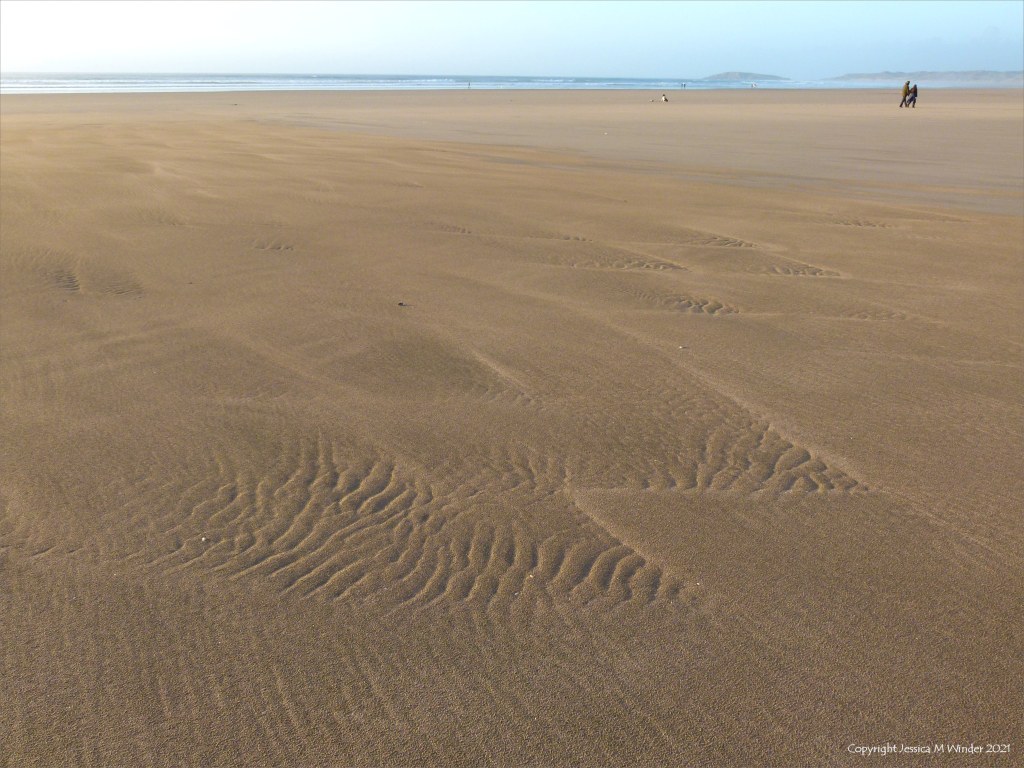Natural abstract ripple patterns in the sand on a beach