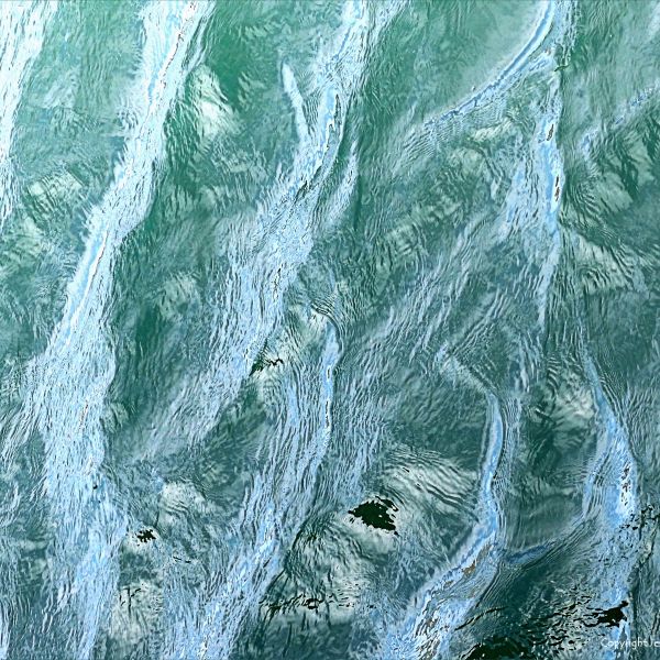 Natural abstract patterns of water surface texture on the sea