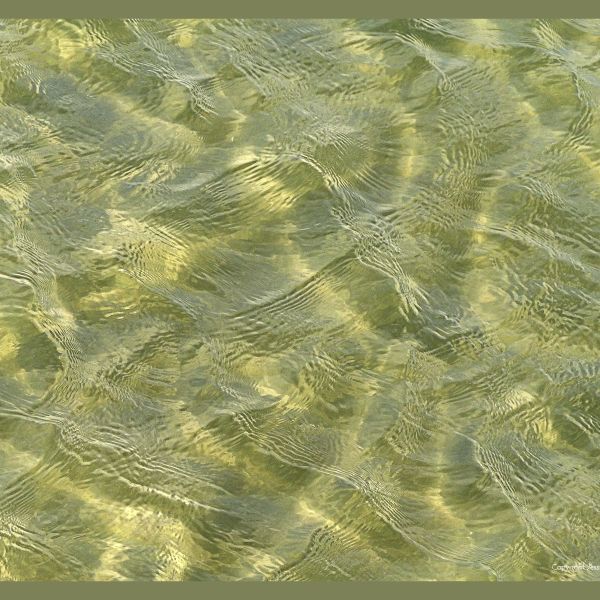 Natural abstract patterns of rippled water surface texture on the sea